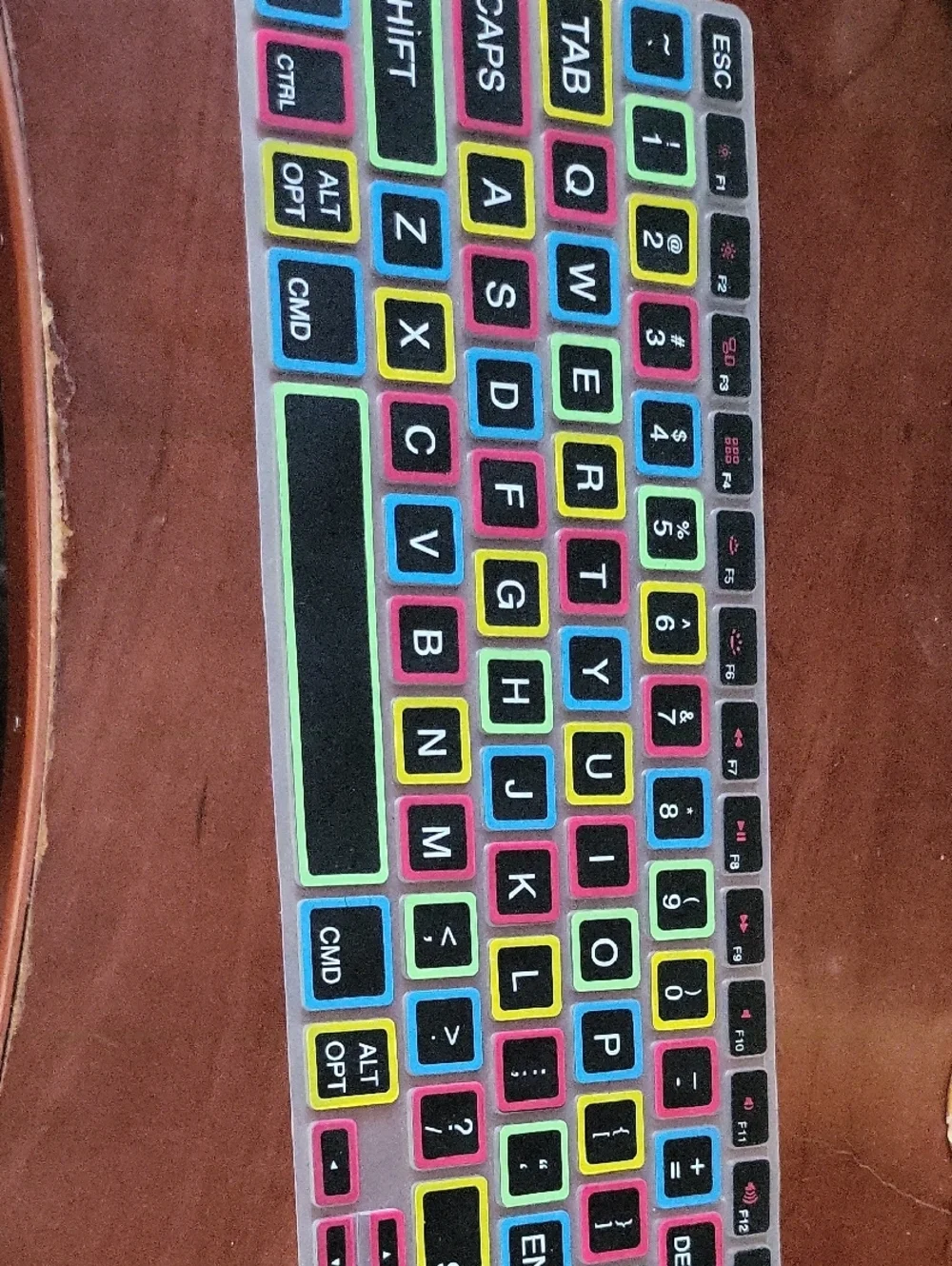 silicone keyboard cover for MacBook Pro and Air features a black layout with lar